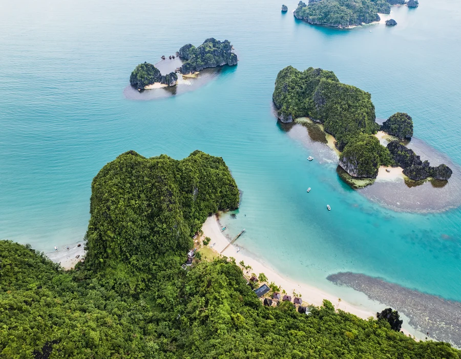 Aerial view of two Caramoan islands joined by a white sand beach, Camarines Sur