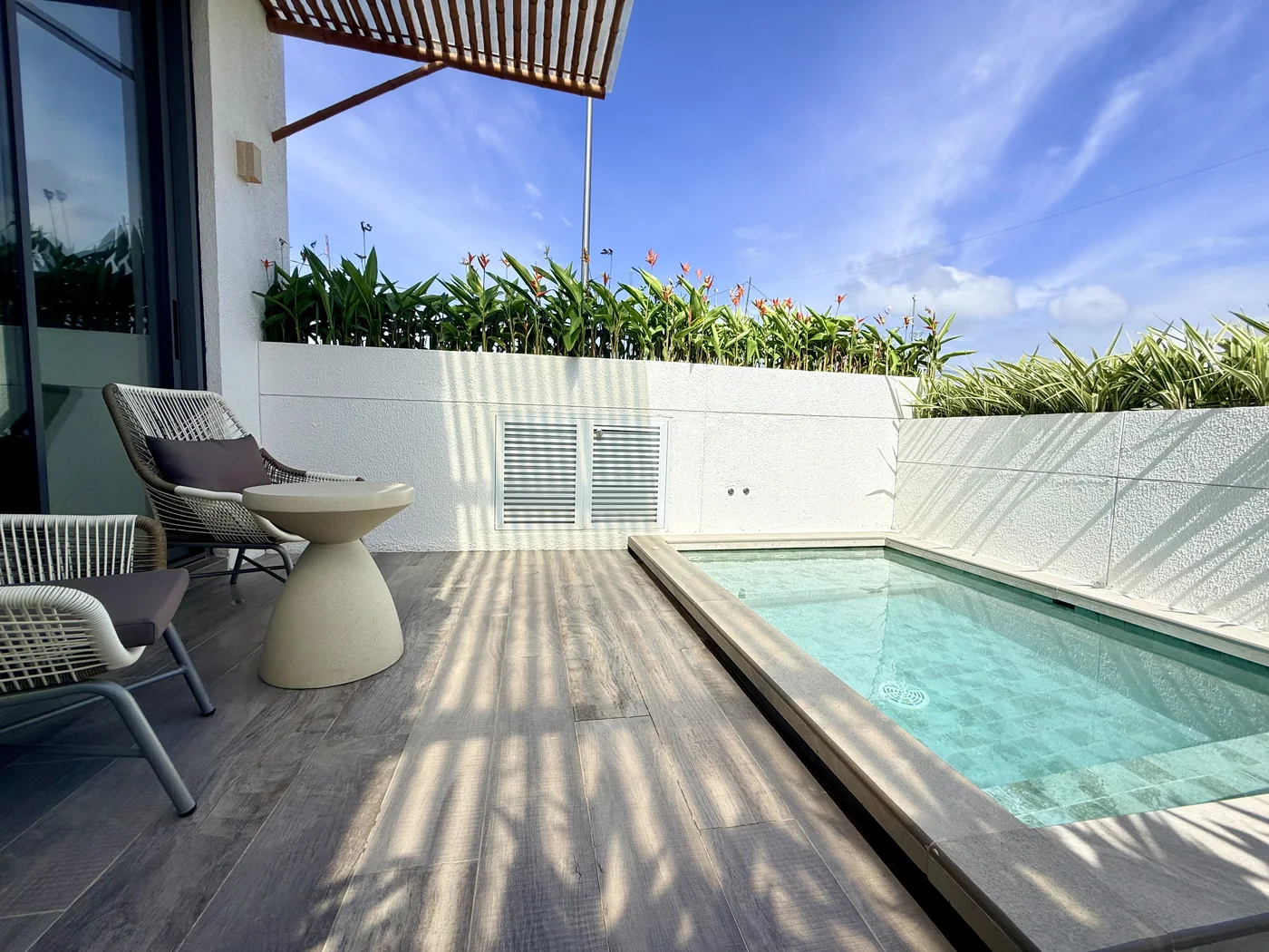 Private pool of a San Fernando Premium Villa, with the timber deck and pergola